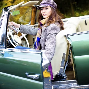 Girl in front of Post-War classic car Girl in front of Post-War classic car