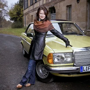 Girl in front of Post-War classic car Girl in front of Post-War classic car