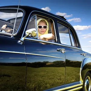 Girl in the Post-War classic car Mercedes Ponton 220SE Y Girl in the Post-War classic car Mercedes Ponton 220SE Y