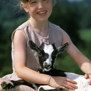 Girl with Pygmy Goat Print (Capra hircus) Girl with Pygmy Goat Print (Capra hircus)