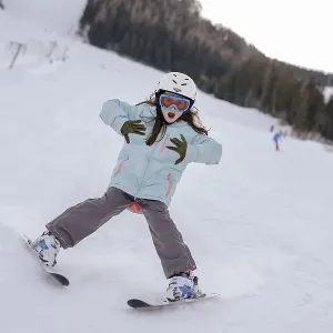 Girls skiing, ski course