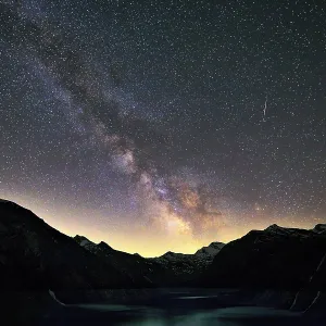 Glittering Milky Way stretches over the mountain range