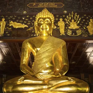 Golden Buddha statue in the Bot of Wat Phuttha Nimit Phra Saiyat Golden Buddha statue in the Bot of Wat Phuttha Nimit Phra Saiyat