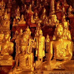 Many golden Buddha statues in Pindaya Cave Shan State Burma