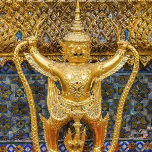 Detail of golden decoration statues at Wat Phra Kaew emerald buddha temple