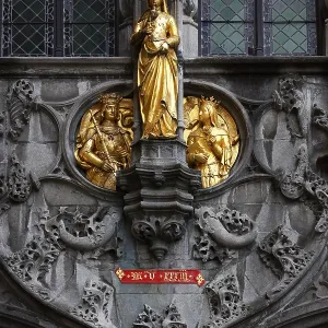 Golden figures on the richly decorated facade of the St