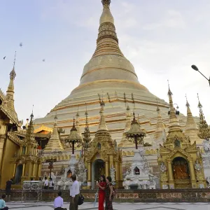 Golden Pagoda at sunset with visiting people