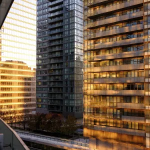 Golden sunset reflecting off urban skyscrapers Golden sunset reflecting off urban skyscrapers