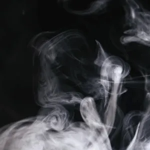 Grey smoke waves black background Grey smoke waves black background