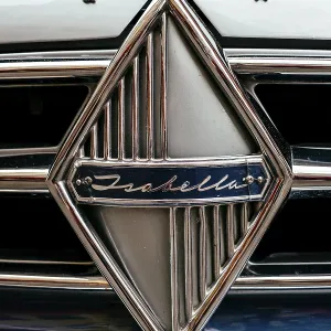 Grille with emblem and type designation Isabella