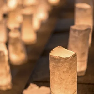 Handmade japanese washi paper lanterns illuminating the stone steps of the Zojoji temple near the Tokyo Tower during