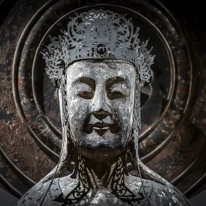 Head of a Japanese Buddha statue Head of a Japanese Buddha statue