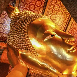 Head of the Reclining Budda in a temple in Bangkok
