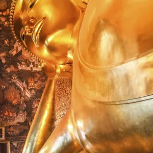Head of the Reclining Buddha in a temple in Bangkok