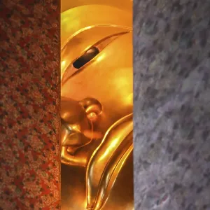 Head of the Reclining Buddha in a temple in Bangkok