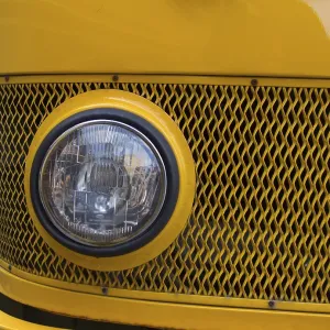 Headlight of a vintage car closeup from nostalgic past