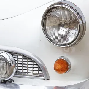 Headlights and indicators of a German sports car from the sixties Headlights and indicators of a German sports car from the sixties