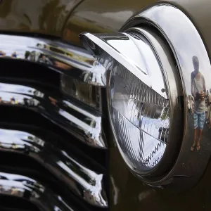 Headlights and radiator grille on a classic car