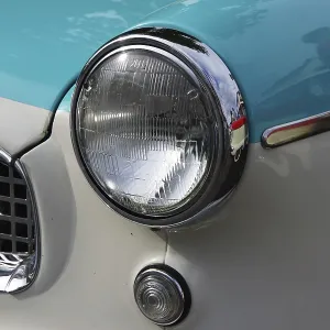 Headlights and radiator grille on a classic car