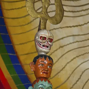 Heads on a trident in a temple, Lhasa, Tibet, Asia