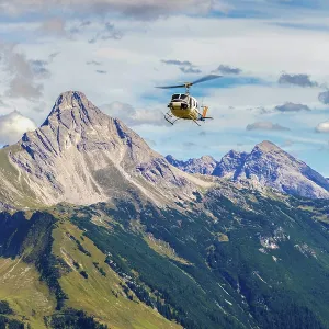 Helicopter Over Mountainous Region Print
