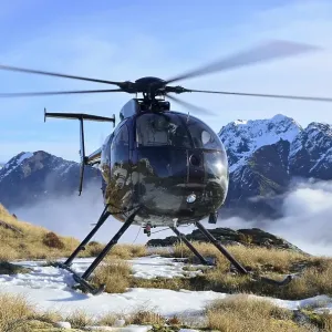 Helicopter waiting for hunters in South Westland's Southern Alps