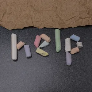 Help word written incoloured chalk on a black chalkboard Help word written incoloured chalk on a black chalkboard