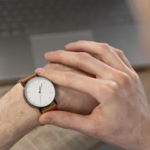 High angle man looking his watch
