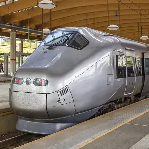 High speed train Flytoget train at Lufthavn Airport station in Oslo High speed train Flytoget train at Lufthavn Airport station in Oslo