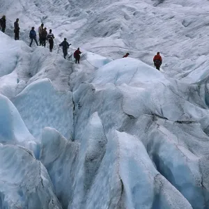 Hiker on glacier, Briksdalsbreen Hiker on glacier, Briksdalsbreen