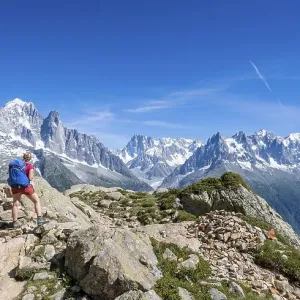 Hiker on hiking trail, Grand Balcon Sud Hiker on hiking trail, Grand Balcon Sud