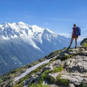 Hiker on a hiking trail, Grand Balcon Sud Hiker on a hiking trail, Grand Balcon Sud