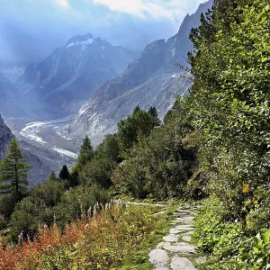 Hiking trail in autumn-colored surroundings with the Mer de Glace glacier Hiking trail in autumn-colored surroundings with the Mer de Glace glacier
