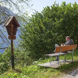 Hiking trail with bench, hikers