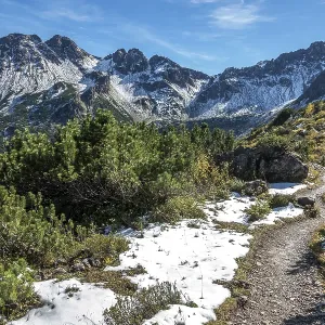 Hiking trail around the pulpit in autumn vegetation