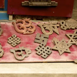Hindu and Buddhist symbols, including the swastika