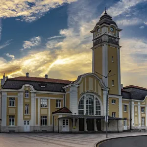 Historic building with clock tower at sunset Historic building with clock tower at sunset