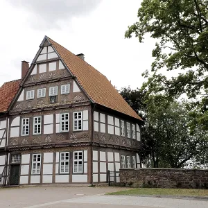 Historic old office building, artistically decorated half-timbered building