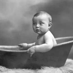 Historic photograph, baby in the bathtub Historic photograph, baby in the bathtub
