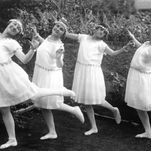 Historic photograph, four dancing women Historic photograph, four dancing women