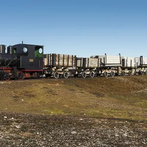 Historic mine train in front of the Kongsfjorden Historic mine train in front of the Kongsfjorden