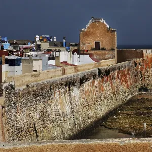 Historic wall over the city overlooking the sea