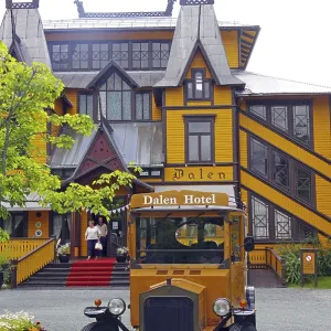 Historic wooden hotel and vintage car Historic wooden hotel and vintage car
