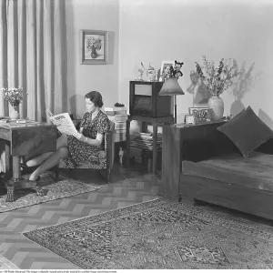 Home Life in 1941 Print: A Woman Reads Falbygdens Tidning