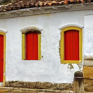 House facade with colorful doors and windows in the historic city of Paraty House facade with colorful doors and windows in the historic city of Paraty