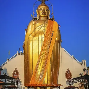 Huge Golden Buddha statue outside a temple in Bangkok Huge Golden Buddha statue outside a temple in Bangkok