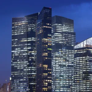 Huge skyscrapers skyline in Singapore downtown by twilight time