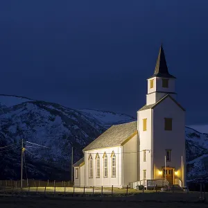 Illuminated church during blue hour Illuminated church during blue hour