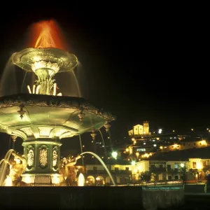 Illuminated fountain on Placa de Armas