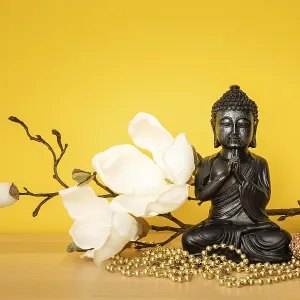 An image of a buddha statue sign for peace and wisdom An image of a buddha statue sign for peace and wisdom